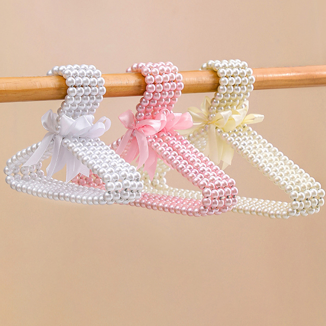 Decorative beaded hangers for pet clothing
