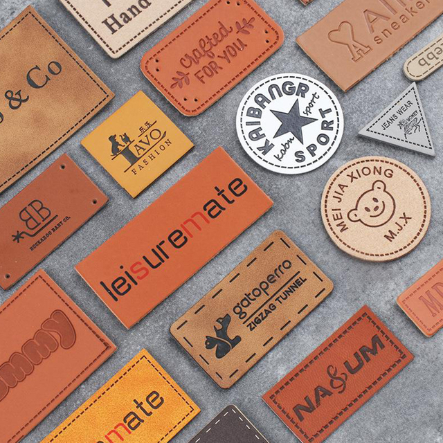 Laser-engraved leather labels for custom pet clothing