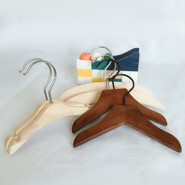 Assorted coat hangers for pet clothing display